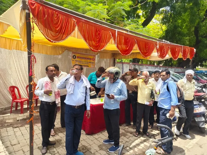 Advocates enjoying sharbat at the stall